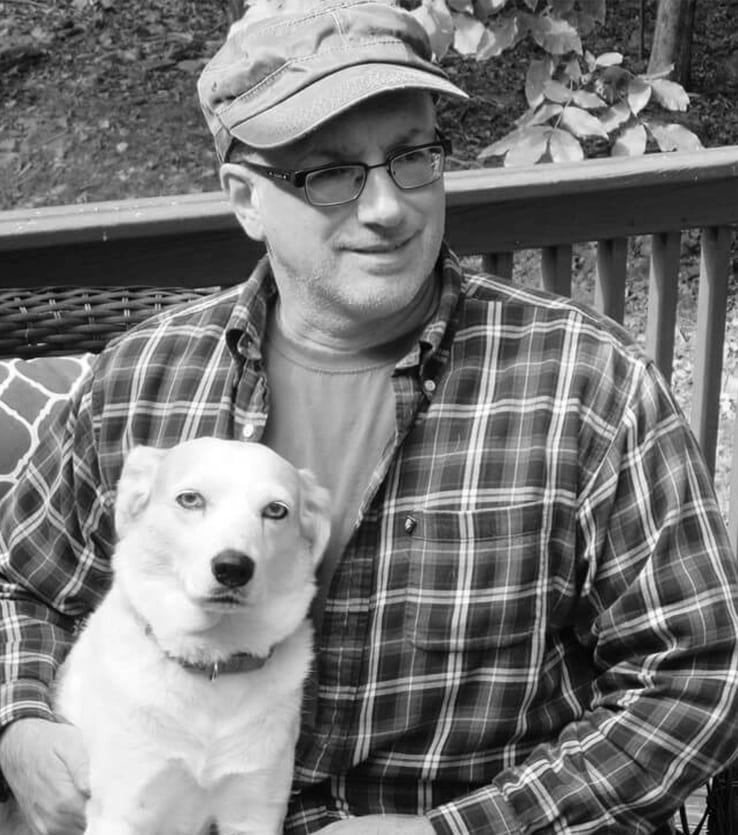 Chuck Augello with his dog